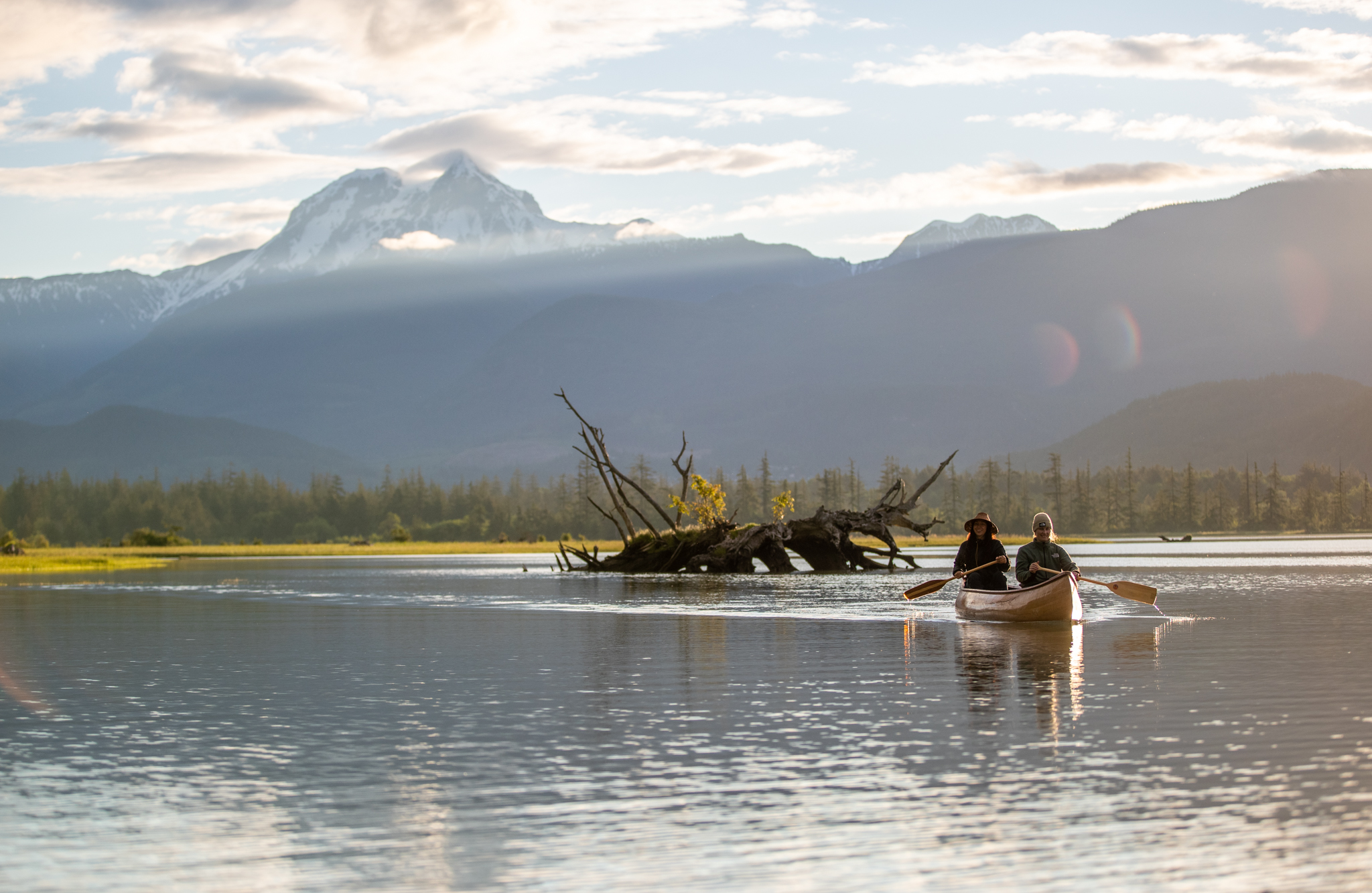 Canoe tour on Squamish River with mountain backdrop